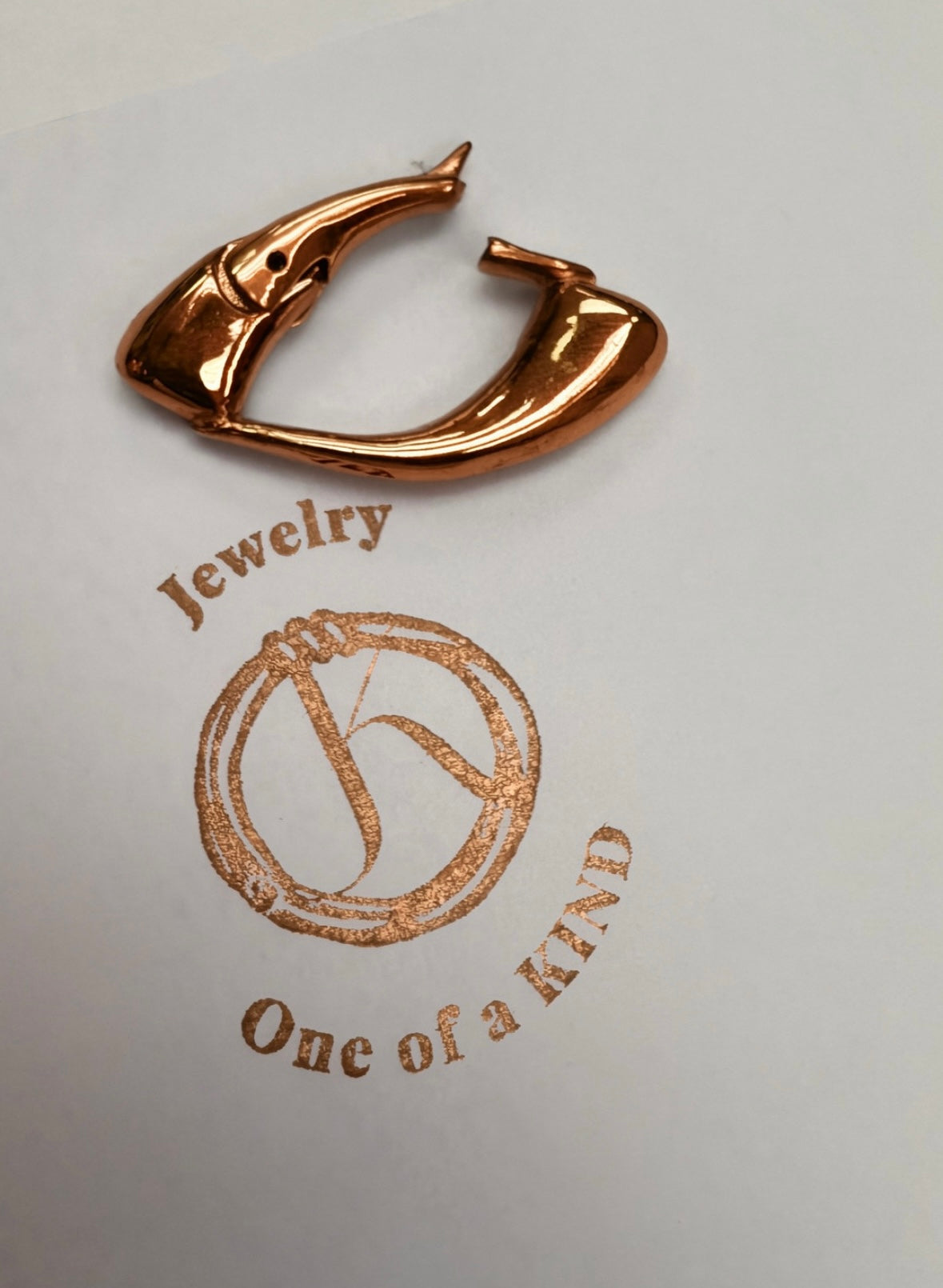 Culebra_Connector_Bronze on a white card with 'Jewelry One of a Kind' branding.