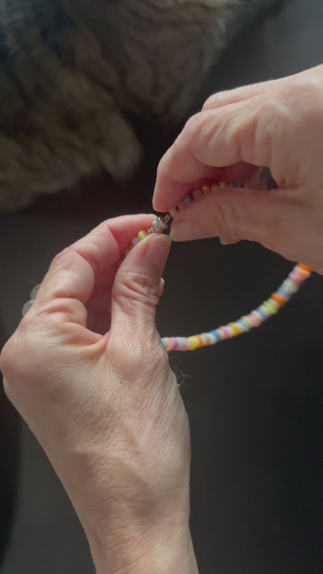 Demonstration of magnetic clasp closure on the Smartie Candy Necklace with Ethiopian opal rondelle beads